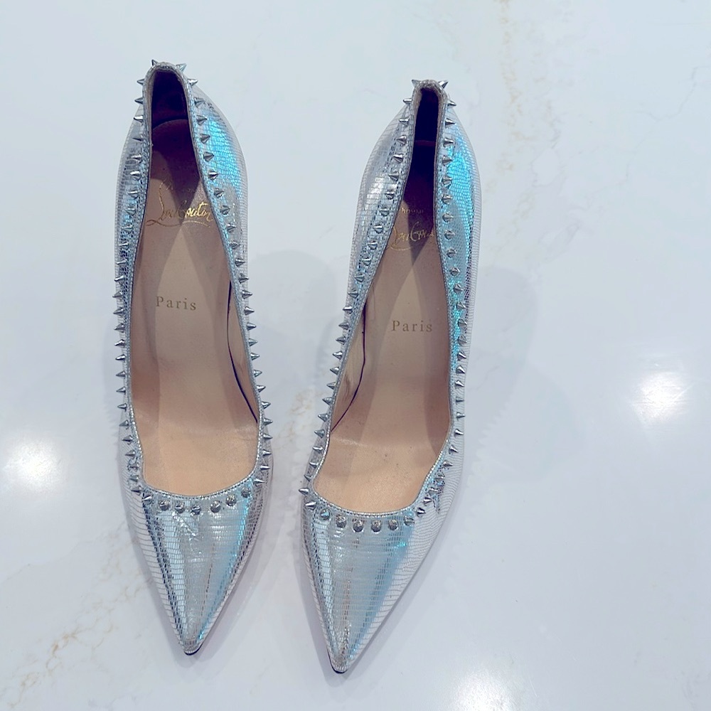 Authentic silver high heels shoes from louboutain worn only one time